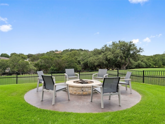 view of patio featuring a fire pit