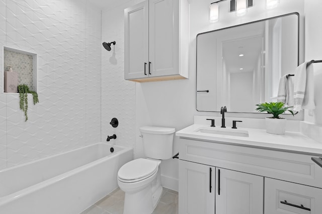 full bathroom featuring tile patterned flooring, vanity, toilet, and tiled shower / bath