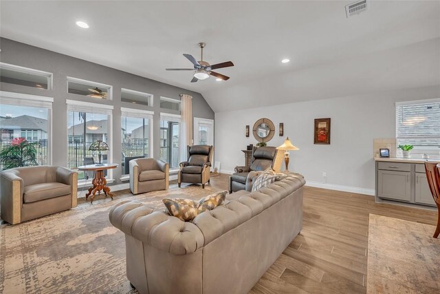 116 Berkeley Pl, Georgetown, TX 78628 - living room featuring ceiling fan, light wood finished floors, healthy amount of natural light, lofted ceiling, and recessed lighting