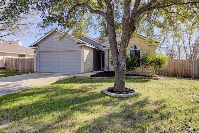 ranch-style home featuring a front yard and a garage