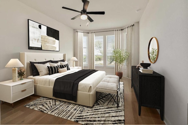 bedroom featuring ceiling fan and wood finished floors