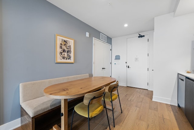 dining space featuring light hardwood / wood-style flooring