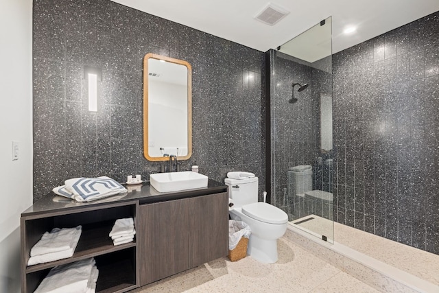 bathroom featuring walk in shower and tile walls