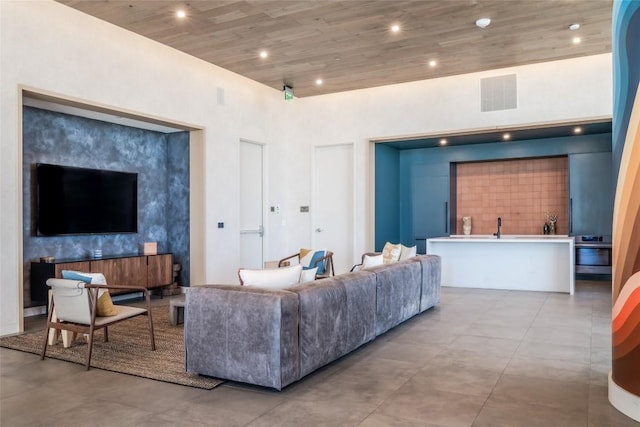 living room with wood ceiling