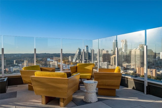 exterior space featuring outdoor lounge area and a balcony