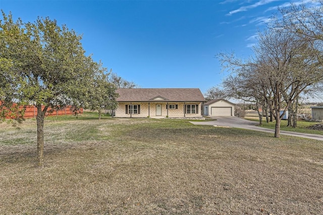 single story home with a garage and a front yard