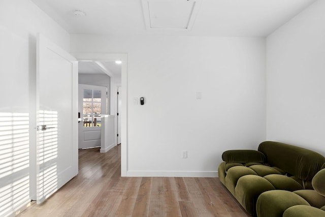 sitting room with light wood-type flooring