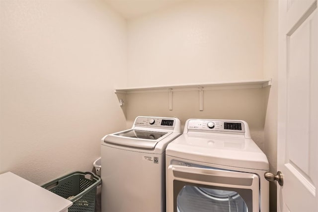 laundry area featuring independent washer and dryer