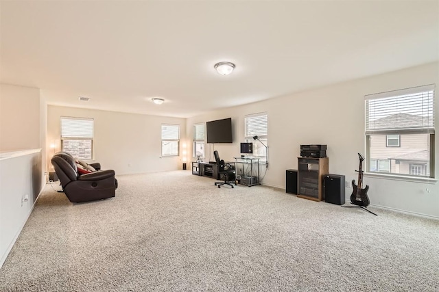 interior space featuring carpet flooring and a healthy amount of sunlight