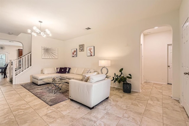 living room featuring an inviting chandelier