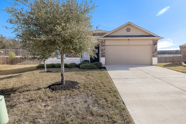 view of front facade with a garage and a front lawn