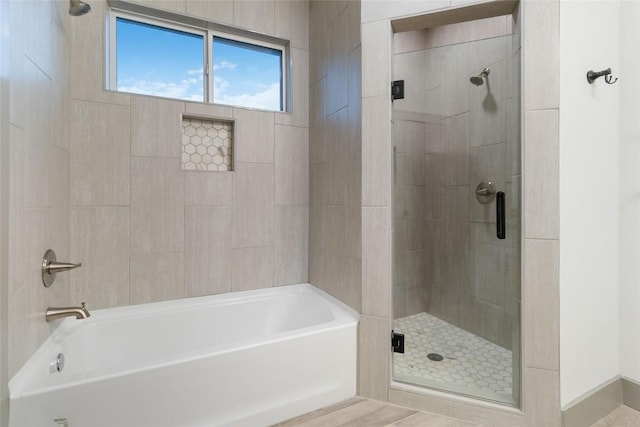 bathroom with independent shower and bath