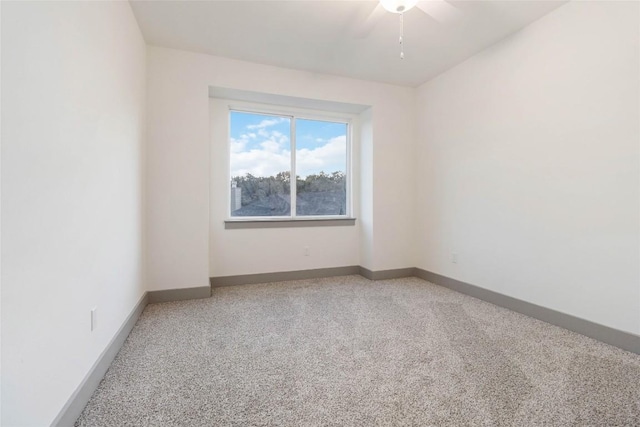 unfurnished room featuring ceiling fan