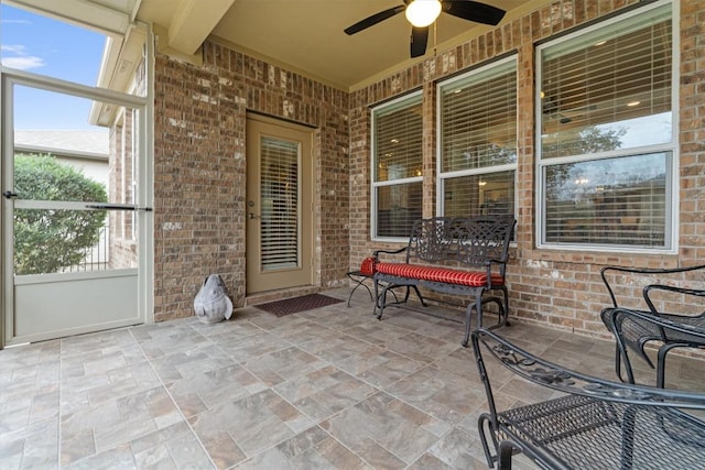 view of patio / terrace featuring a ceiling fan