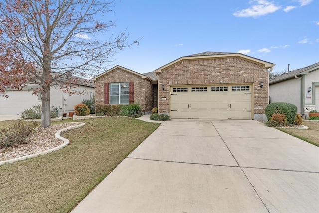 ranch-style house featuring a garage, driveway, a front lawn, and brick siding