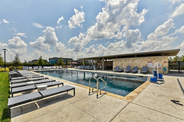 view of swimming pool featuring a patio area