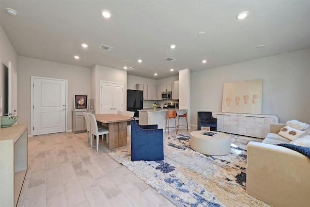 living room with light wood-type flooring