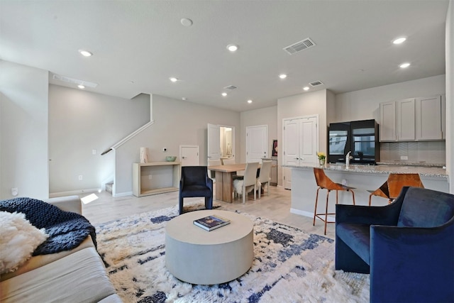 living room with light wood-type flooring