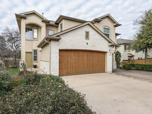 front of property featuring a garage