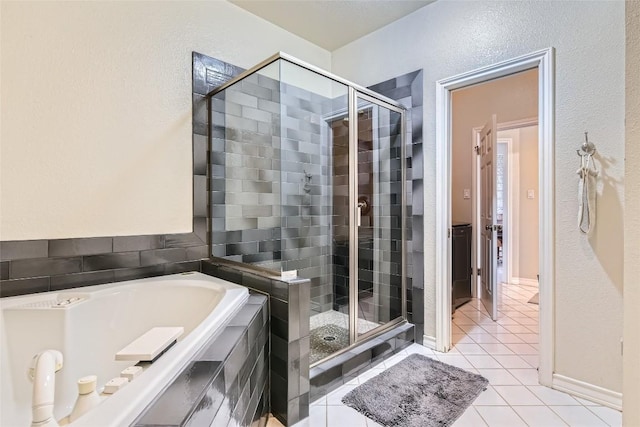 bathroom featuring tile patterned flooring and plus walk in shower