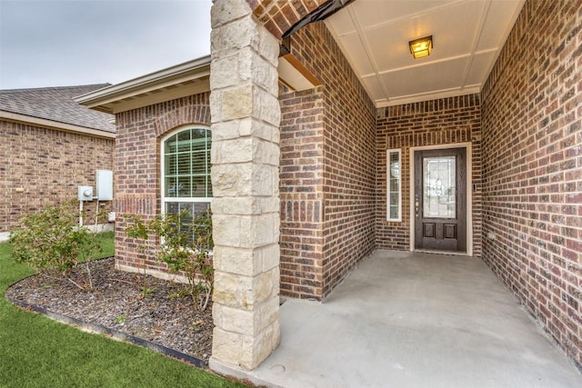 doorway to property with a patio