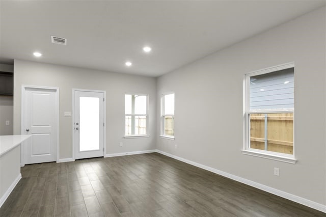 interior space with dark hardwood / wood-style floors