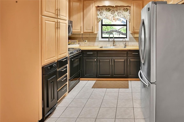 kitchen with light tile patterned flooring, sink, stainless steel appliances, and tasteful backsplash