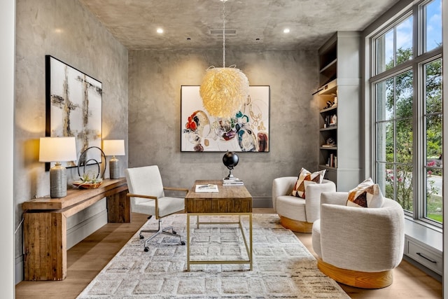 living area with light hardwood / wood-style floors