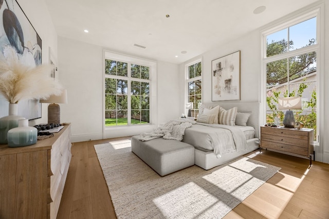 bedroom featuring light hardwood / wood-style floors