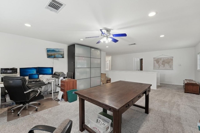 office area with light carpet and ceiling fan