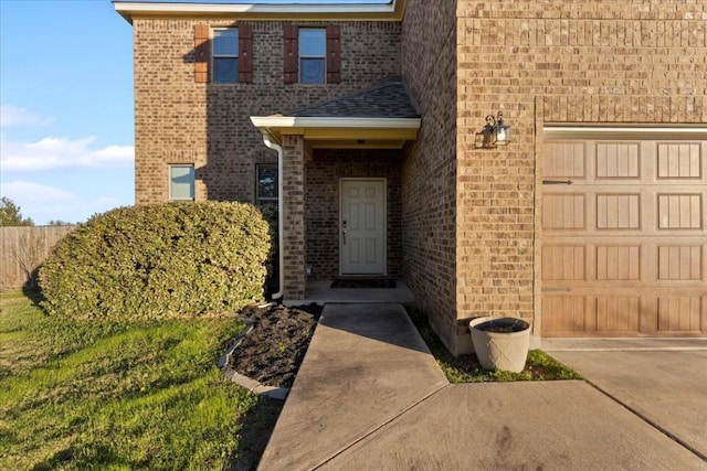 property entrance with a garage