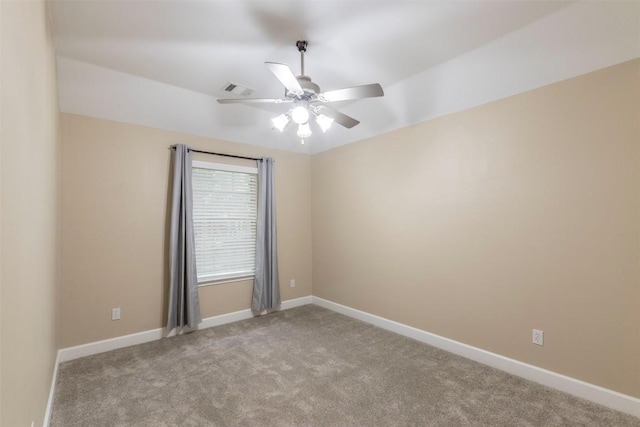 carpeted empty room with ceiling fan