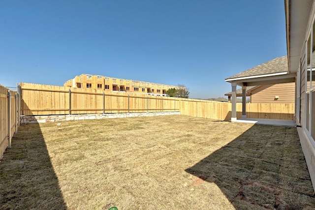 view of yard featuring a fenced backyard