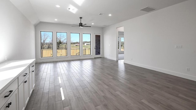 unfurnished living room featuring dark wood-type flooring, recessed lighting, visible vents, and ceiling fan