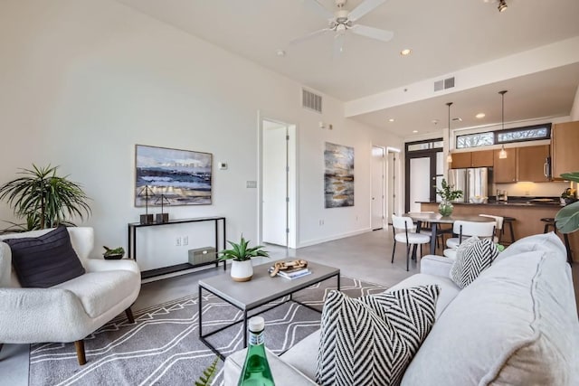 living room with ceiling fan