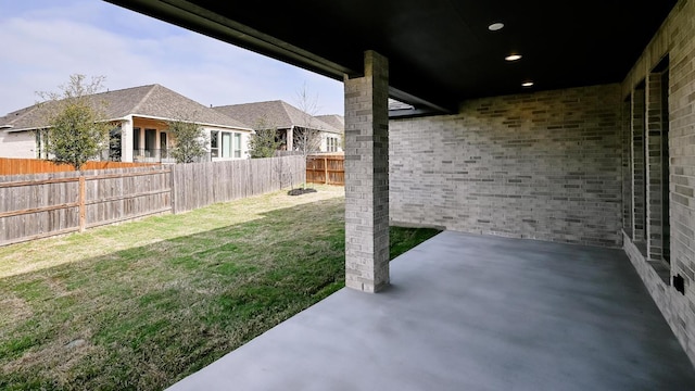 view of yard featuring a fenced backyard and a patio area
