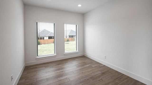 267 Carpenter Hill Dr, Buda, TX 78610 - unfurnished room with wood finished floors and recessed lighting