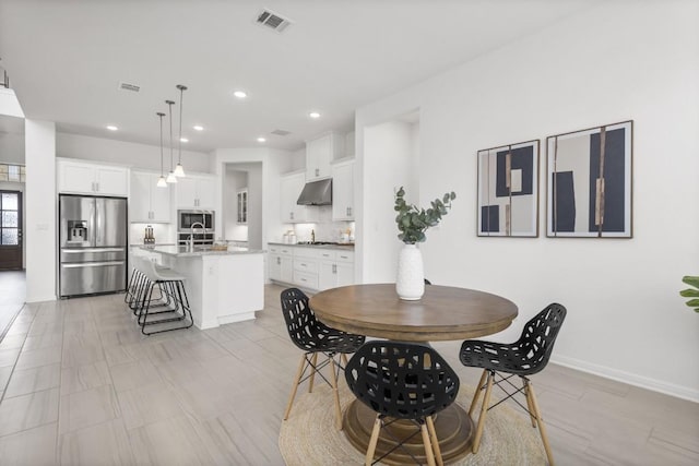 dining space featuring sink