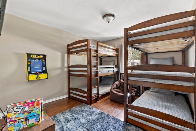 bedroom featuring wood-type flooring