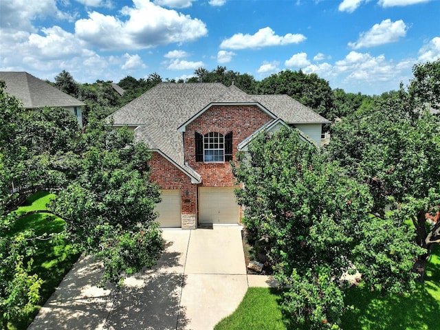 front of property with a garage