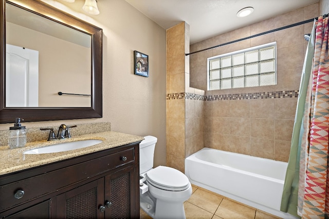 full bathroom with tile patterned floors, vanity, toilet, and shower / bathtub combination with curtain