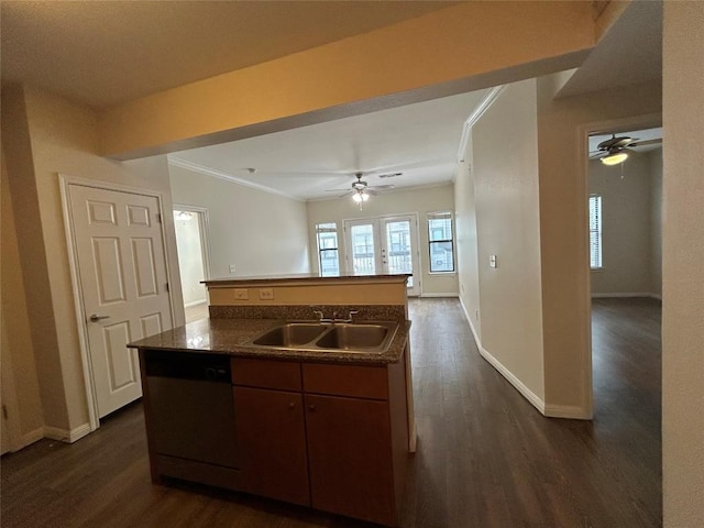 kitchen featuring a sink, a ceiling fan, ornamental molding, and dark wood-style flooring