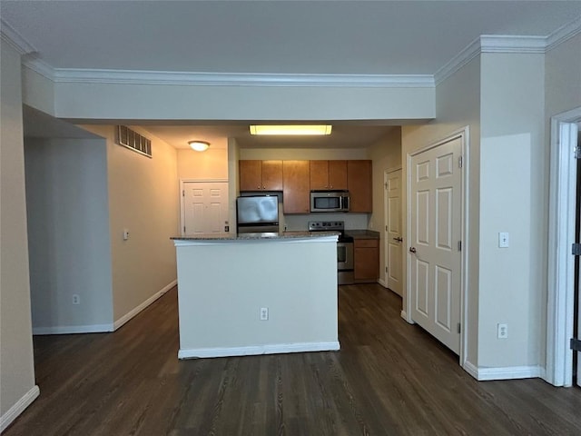 2502 Leon St Unit 317, Austin, TX 78705 - kitchen featuring stainless steel appliances, dark wood-style flooring, brown cabinetry, and crown molding