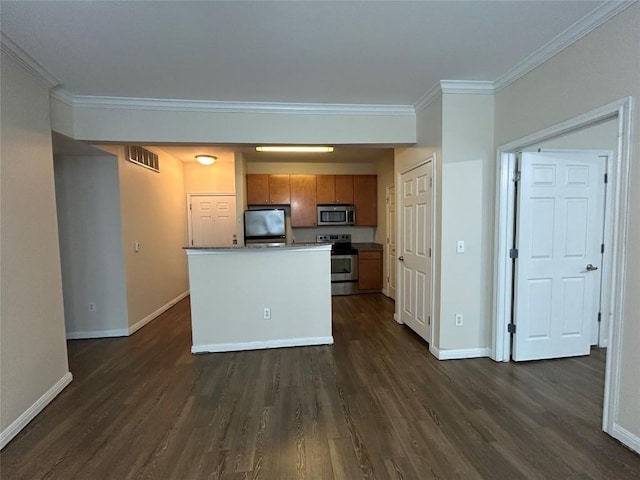 2502 Leon St Unit 317, Austin, TX 78705 - kitchen featuring appliances with stainless steel finishes, dark wood-style flooring, brown cabinetry, and crown molding