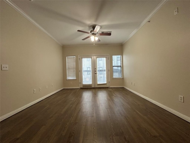 unfurnished room featuring dark wood-type flooring, french doors, baseboards, and ornamental molding