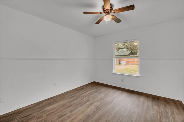 7209 Gunnison Pass, Austin, TX 78724 - empty room with wood finished floors, baseboards, and a ceiling fan