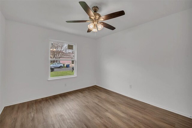 7209 Gunnison Pass, Austin, TX 78724 - spare room with wood finished floors and a ceiling fan
