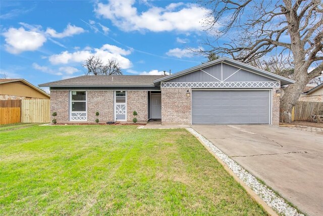 7209 Gunnison Pass, Austin, TX 78724 - single story home with brick siding, a garage, concrete driveway, and roof with shingles