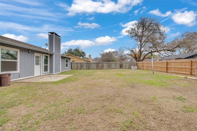 7209 Gunnison Pass, Austin, TX 78724 - fenced backyard with a patio area