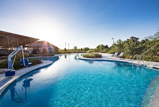 view of pool featuring a patio